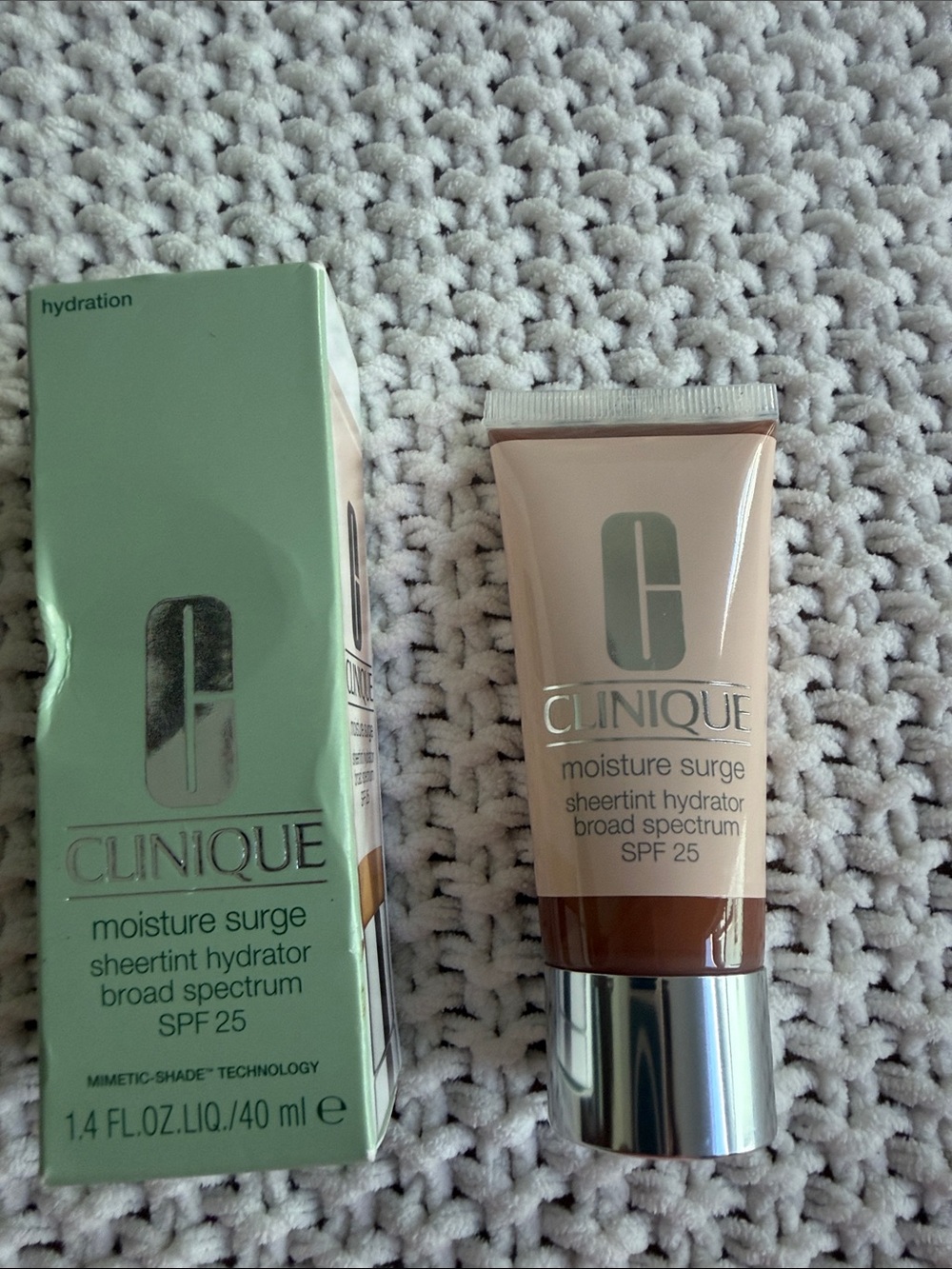 Clinique Moisture Surge Sheertint Hydrator SPF 25 — Universal Deep Brown